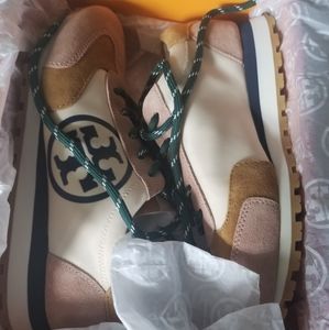 Tory Burch Runners. Size 8. Brand new in box. Paid $295 U.S. in November.